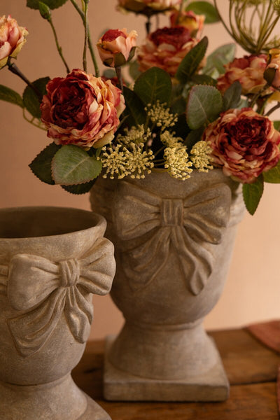 Set of 2 Concrete Urns with Bow Detail