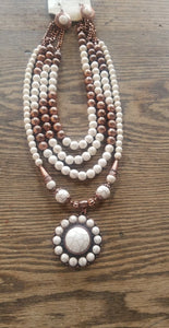 White and copper multi strand necklace with matching earrings