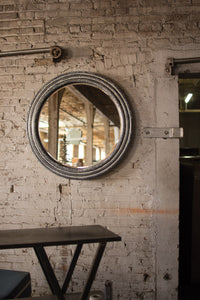 round metal wall mirror